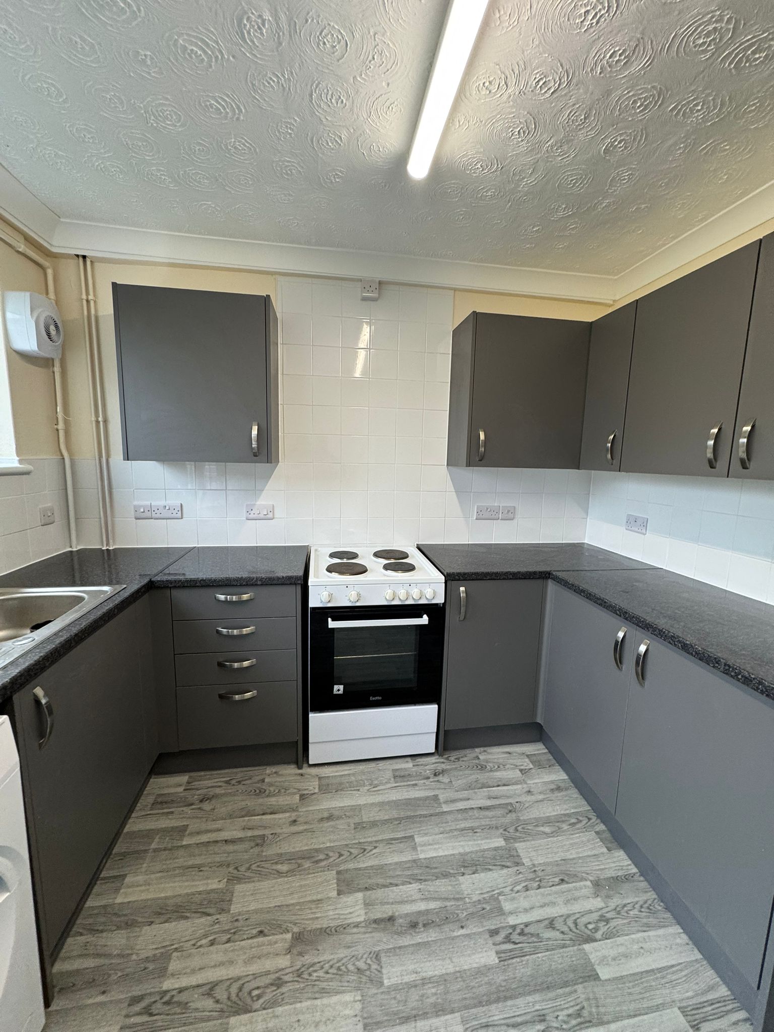Image of the kitchen after the new one was fitted